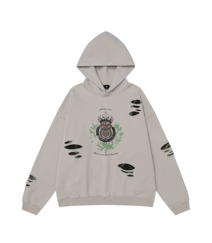Ripped and patched cream hoodie
