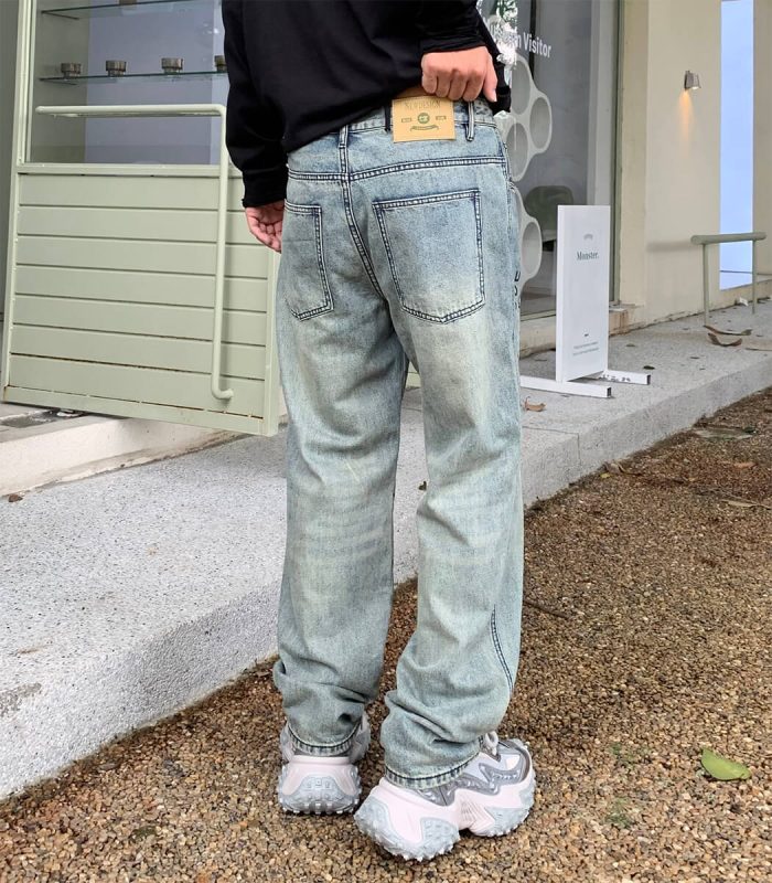 Vintage blue denim pants with graffiti print
