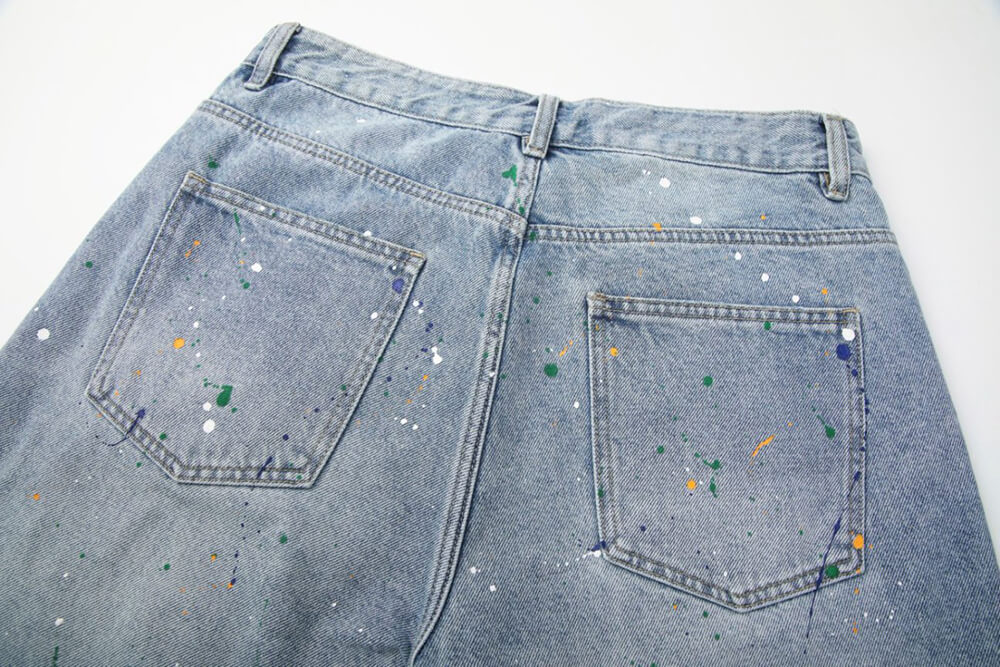 light blue denim shorts with splatter paint