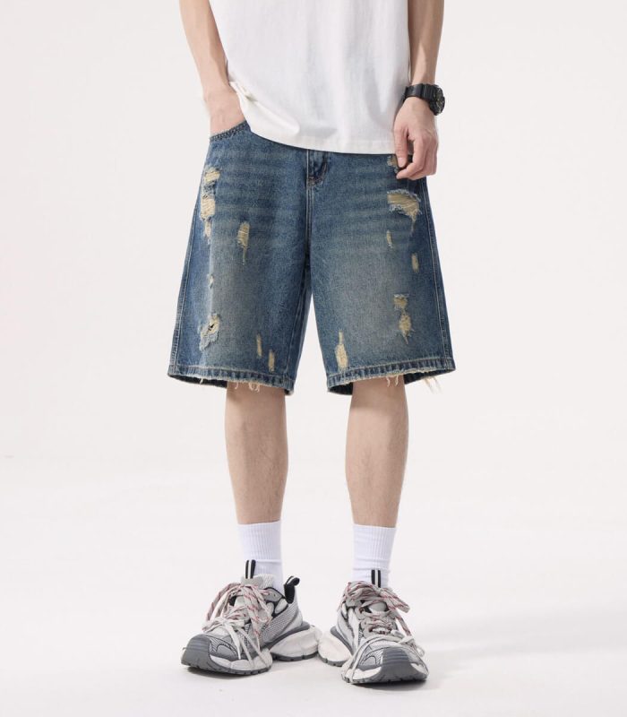 ripped blue denim shorts